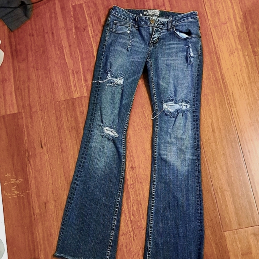 Size 3 Tattered Jeans.